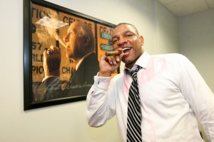 Doc Rivers gives tribute to Celtics patriarch Red Auberbach by lighting a cigar.